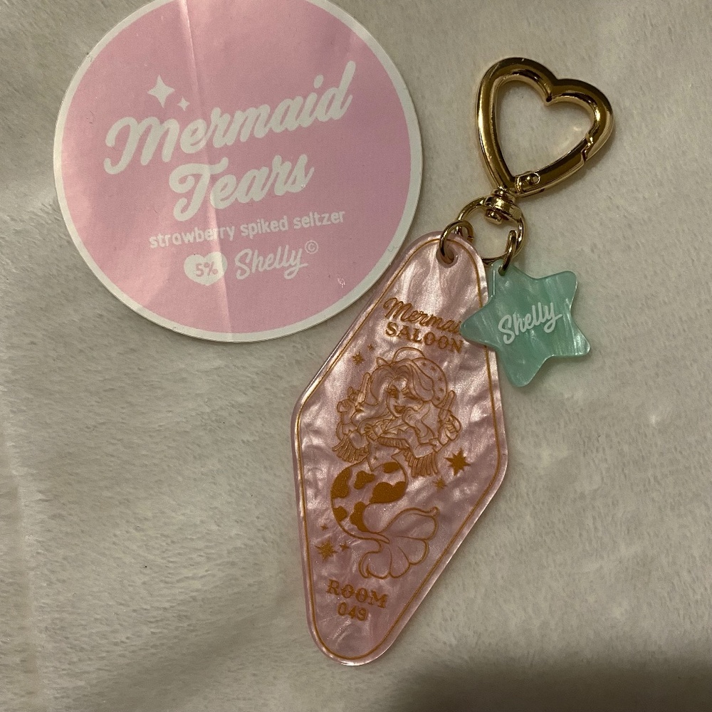 sugar bones keychain and sticker